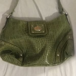 Green small purse free w purchase of 20 +